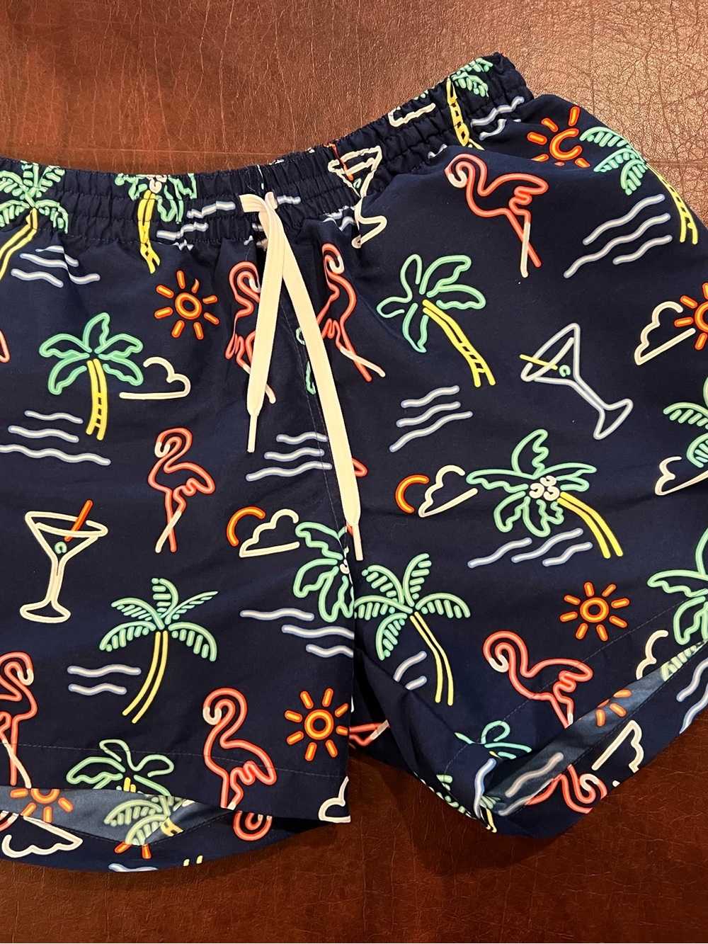 chubbies Navy Swim Trunks with Neon Tropical Accents